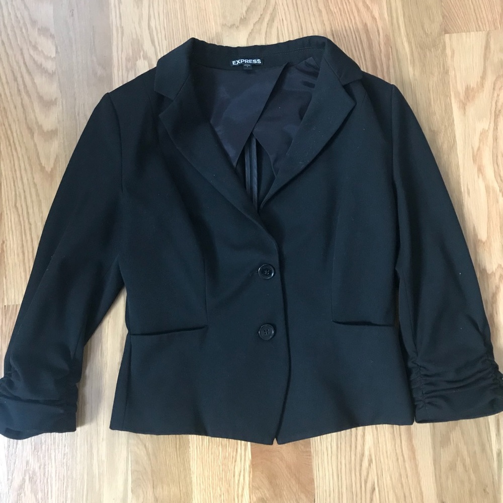 Women’s Blazer with ruched sleeve, never used.